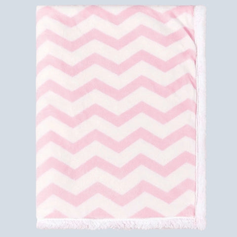 Couverture bebe polaire motifs géométriques roses