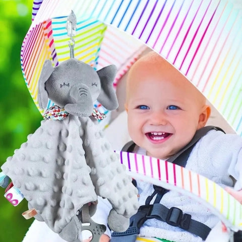 Doudou éléphant accroché à la poussette