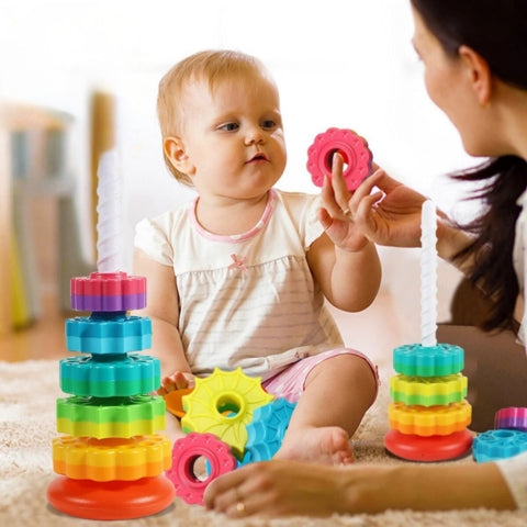Jouet bebe tour à empiler maman et bébé jouant ensemble