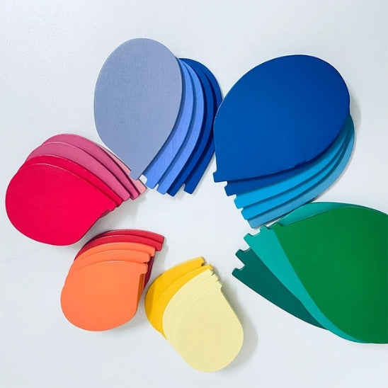 Jouet en bois bébé détail feuilles multicolores de l’arbre musical