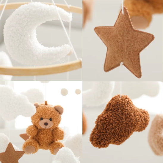 Gros plan sur ours, étoile, nuage, lune du mobile bebe