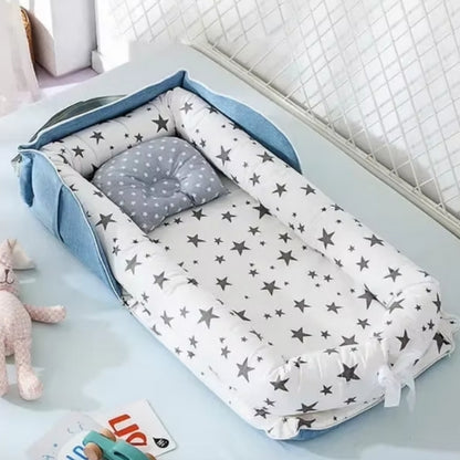 Reducteur de lit bébé portable blanc avec motifs étoiles grises