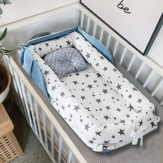 Reducteur de lit bébé protection couchage dans lit à barreaux