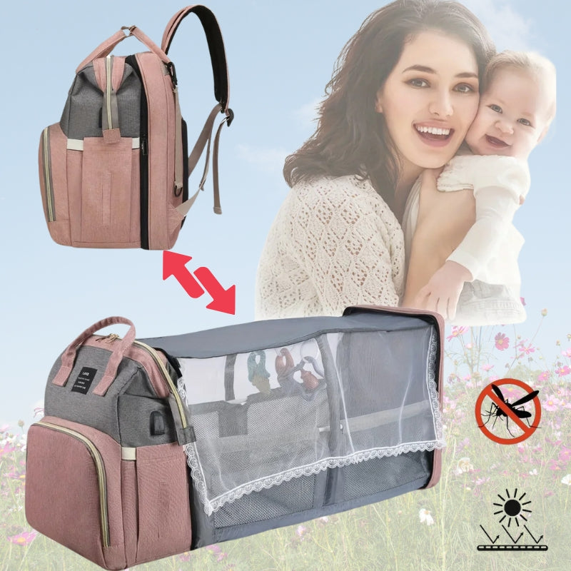 sac a langer lit rose avec lit d'appoint intégré